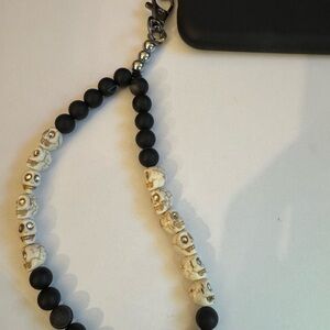 Cell phone wristlet from The Charm Hut works on any phone case